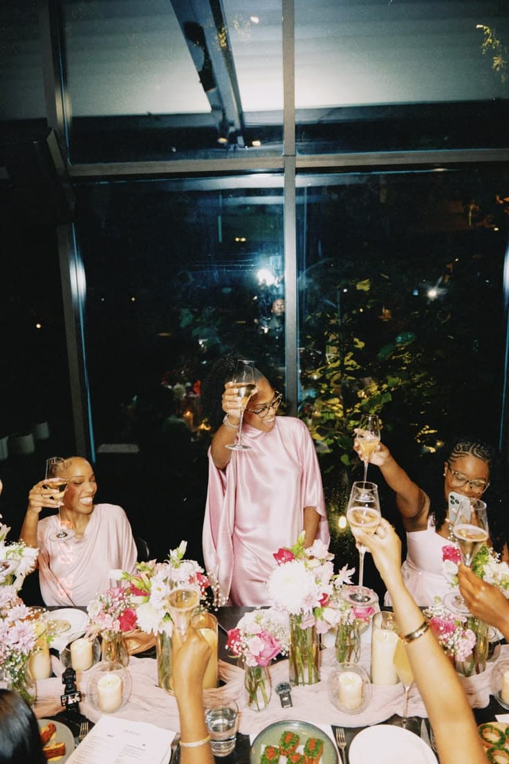 Women toasting together at the Pre-Launch gathering